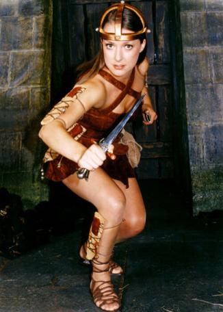 Stiletta (Joanne Heywood) poses with a knife in a promotional shot for Series 8 of Knightmare.