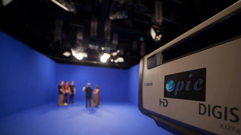 The Geek Week contestants on the blue screen with an Epic Studio camera in the foreground.