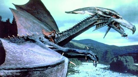A promotional image of Smirkenorff the Dragon with broader wings set against a mountainous backdrop.