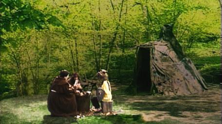 A clearing and hut in Wolfglade, as seen in Series 5 of Knightmare (1991).