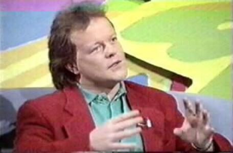 Bruno Brookes (former Radio 1 and TV presenter of Beat the Teacher) on CBBC's Take Two (1991).