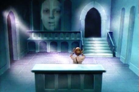 Knightmare Series 3 Team 11. Martin lifts the helmet to hear the words of the oracle.