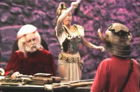 Knightmare Series 4 Quest 4. Gundrada draws letters behind Hordriss's back.