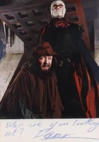 A 1994 character shot of Lord Fear (Mark Knight) and Sylvester Hands (Paul Valentine).